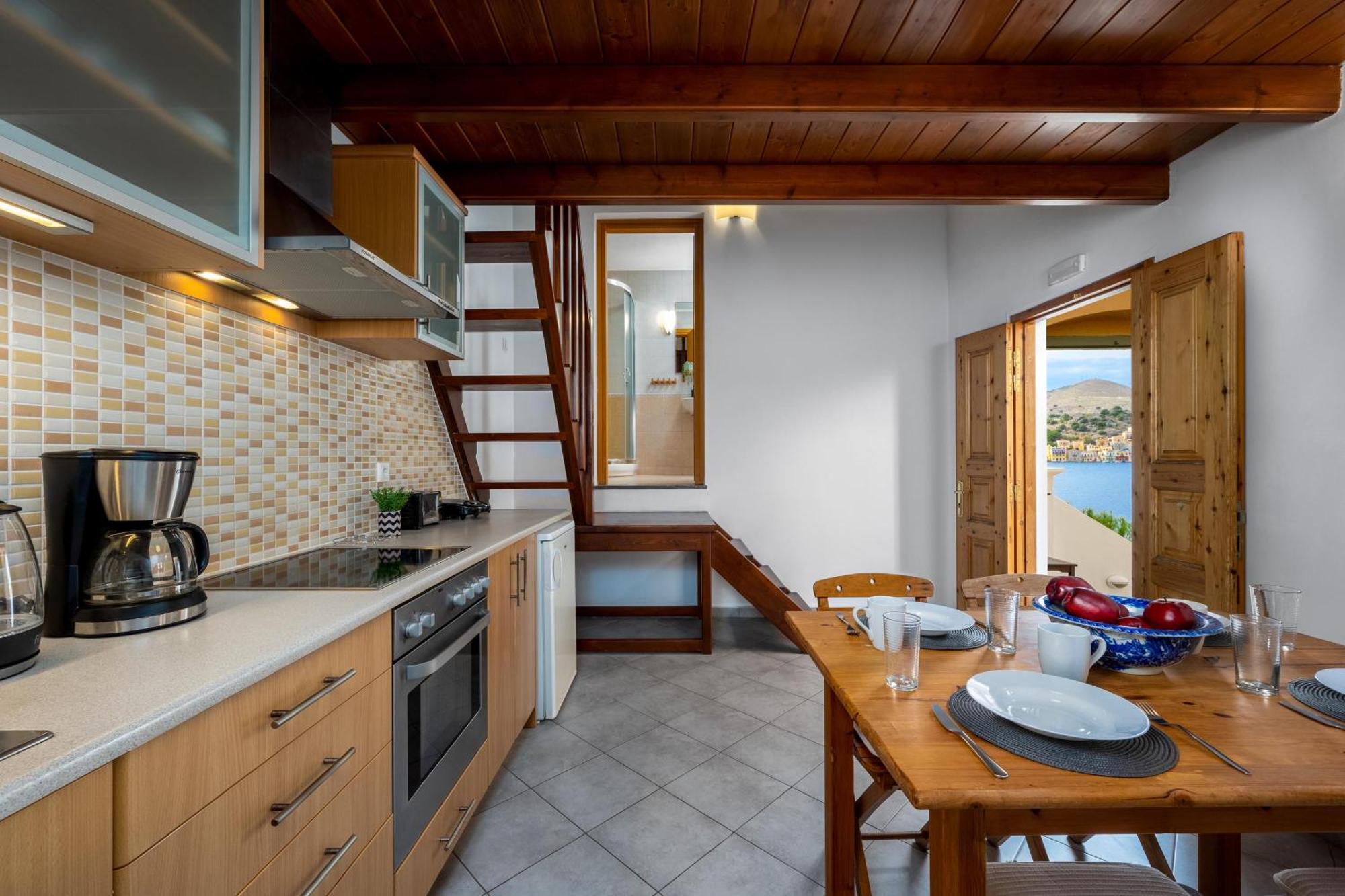 Over The Sea Apartments Sými Esterno foto